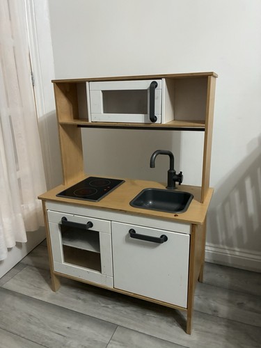 Wooden toy kitchen for